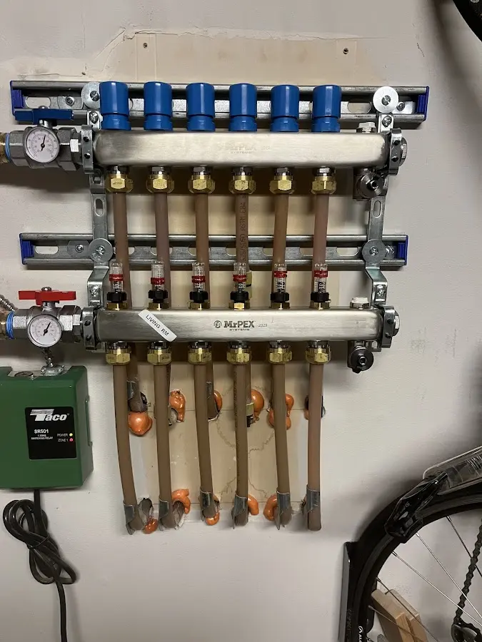 Plumber performing Sink Repair at a residential property in Normandy
